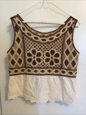 boho-style crochet tank top with eyelet lace on the bottom